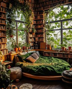 a bedroom with lots of bookshelves and plants in the window sill area