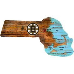 a wooden map of boston with the hockey team's logo on it, as well as other items