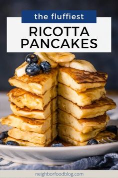 a stack of ricotta pancakes with blueberries on top and the title overlay reads, the flufflest ricotta pancakes