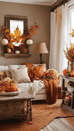 a living room filled with lots of fall decorations