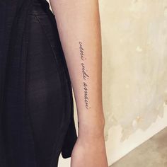 a woman's arm with a tattoo that says, i love you to the moon and back