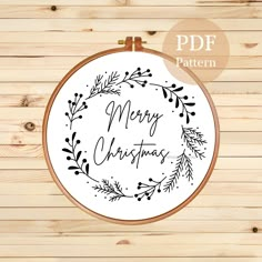 the merry christmas embroidery pattern on a hoop