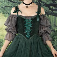 Our dark green velvet corset is the ultimate statement piece for those seeking a blend of luxurious elegance and historical charm. Perfect for renaissance faire costumes, Christmas parties, dark and moody aesthetics, or simply adding a bold, regal touch to your wardrobe, this corset is designed to flatter your silhouette while offering comfort and durability. Crafted from rich, 100% cotton deep green velvet, this corset features a classic lace-up front and back lacing for an adjustable fit, and synthetic whalebone boning for structure and support. Pair it beautifully with our linen skirts or petticoats, or style it with high-waisted jeans for a modern twist. Welcome to French Meadows, your dream shop for Renaissance Faire Costumes, including CottageCore corset tops, Renaissance corsets and Green Royalcore, Deep Green Aesthetic, Ren Faire Corset, Wizard Clothes, Elf Witch, Cottagecore Corset, Cottagecore Princess, Velvet Corset Top, Cute Kawaii Outfits