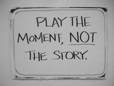 a sign that says play the moment, not the story on white paper with black writing