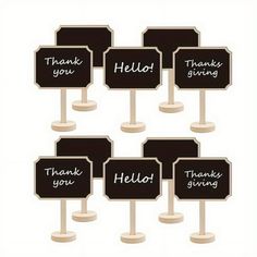 a bunch of black and white signs with writing on them that say thank you, hello