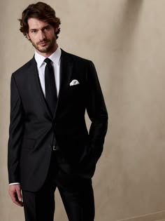 After three years of meticulous research, this suit is finally ready to take flight.  Crafted from a beautiful wool hopsack fabric from Italy's famed Reda mill, renowned for producing luxurious fabrics since 1865.  Finished with signature pickstitch Black Wedding Suits Men, Classic Black Tailored Suit, Timeless Black Tie Suit With Suit Collar, Black Suit Casual, Timeless Black Luxury Suits, Groomsmen Black Suit, Father Of The Bride Suit, Timeless Tailored Black Tie Suits, Wedding Tuxedo For Men