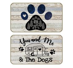 two wooden signs with paw prints and the words you and me and the dogs on them