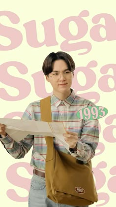 a man holding a piece of paper in front of his face with the words sugar on it