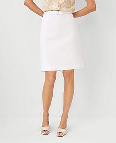 Elevate your wardrobe with the Ann Taylor Tall Belted A-Line Skirt, a testament to timeless elegance and comfort. This skirt is meticulously crafted from a blend of 78% cotton, 20% rayon, and 2% spandex, ensuring both durability and a slight stretch for the perfect fit. The crisp white color makes it a versatile choice for various occasions.

- Size: 4 (Tall)
- Color: White
- Material: 78% Cotton, 20% Rayon, 2% Spandex
- Gender: Female
- Length: 22 inches long
- Features: Includes a self-tie buc Belted Skirt, Chic Skirts, White Belt, Skirt Belt, Cotton Skirt, Buckle Belt, Cinched Waist, White Material, White Skirts