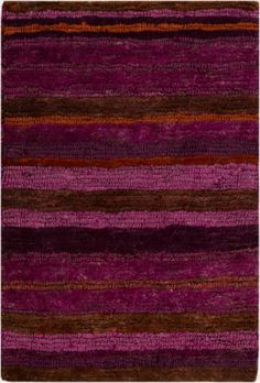 purple and brown rug with horizontal stripes on the bottom, in different colors or sizes