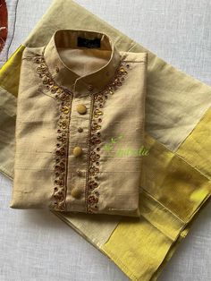 The Outfit consists of Kurtha and Mundu.The Kurtha made of Rawsilk fabric and is embellished with maggam work.The quality and embellishments makes this unique.The Mundu is made of premium quality Kerala Handloom Kasavu fabric.Velcro pasting at waist. So it’s easy to wear for kids.The Kurtha is lined with soft cotton fabric.Size: The picture shows 5-7 year baby boys dress.Any customisation of colours of Kurtha, please let me know. Festive Silk Straight Kurta Set, Festive Silk Thread Straight Kurta Set, Traditional Drape Cotton Silk Sets With Dori Work, Traditional Drape Sets With Dori Work In Cotton Silk, Traditional Drape Cotton Silk Kurta With Multicolor Embroidery, Festive Straight Kurta In Silk Thread, Embroidered Raw Silk Sherwani For Navratri, Festival Tissue Silk Straight Kurta, Semi-stitched Silk Thread Kurta For Festive Occasions