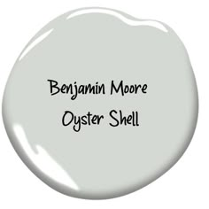 a white paint bottle with the words, bejamini more oyster shell on it