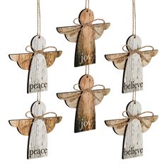 four wooden angel ornaments hanging from strings with the words peace, joy, and joy