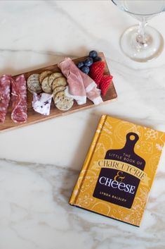 The Little Book of Charcuterie and Cheese paired with a drink and a charcuterie board Meat And Cheese Charcuterie Board, Charcuterie Dinner, Cheese Charcuterie Board, Party Hosting, A Charcuterie Board, Charcuterie Cheese, Party Inspo, Meat And Cheese, Board Ideas