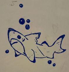 a drawing of a shark with bubbles coming out of it