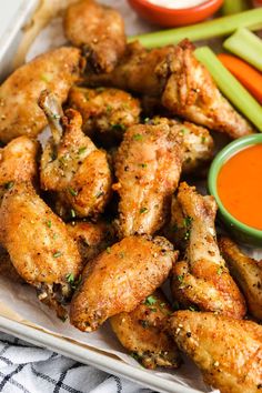 chicken wings with carrots, celery and dipping sauce