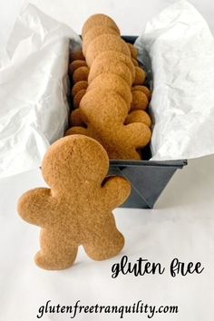 gingerbread cookies in a box with the text gluten free gingerbread cookies