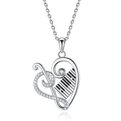 PRICES MAY VARY. Title: ACJNA 925 Sterling Silver Heart Pendant Piano Keyboard Necklace Music Jewelry for Women. Product Type: Departments > Women > Jewelry > Necklaces > Pendant Necklaces Music Necklace, Sterling Silver Heart Pendant, Music Jewelry, Silver Heart Pendant, Sterling Silver Heart, Silver Heart, Gift Necklace, Heart Pendant, Womens Jewelry Necklace