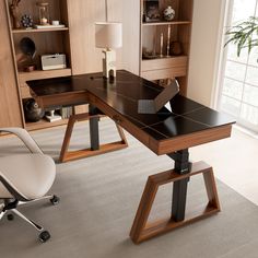 an office desk with a chair and bookcase in front of it, next to a window