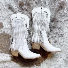 These fashionable, studded cowboy boots will make you stand out in the crowd! The grey fringe adds a unique touch that will turn heads wherever you go. Step into these stylish under-knee boots and express your bold personality. Western Boots With Rhinestone Fringe For Fall, Western Rhinestone Fringe Boots For Fall, Western Boots With Rhinestone Fringe And Round Toe, Spring Boots With Rhinestone Fringe, Western Style Fringe Boots For Spring, Western Fringe Boots For Fall, Western Style Knee-high Boots For Fall Festivals, Western Boots With Tassels For Fall, Western Style Boots With Tassels For Fall