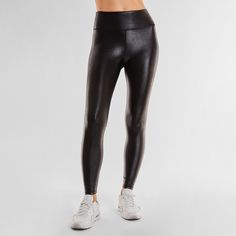 Liquid style from studio to street - meet the Liquid Legging - Black Gloss. Lightweight, lustrous shine, quick drying, and a second skin feel. Smoothing, butt-lifting and so versatile, this legging shines from workout to wear out. Made from imported Brazilian fabric: Xtra Life Lycra for resilience and longevity, this style features four-way stretch. If you fall in between sizes, we recommend sizing down. Black Liquid Leggings, Heart Pump, Athletic Build, Liquid Leggings, Black Liquid, Black Gloss, Second Skin, Feeling Great, Black Leggings