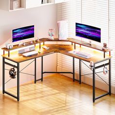 a corner desk with two computer monitors on it