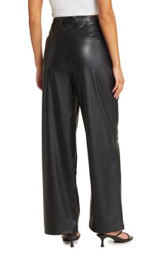 Made with sleek pleats and full-length legs for a tailored look, these faux-leather trousers add a chic edge to any ensemble. 29 1/2" inseam; 23" leg opening; 13" front rise; 15 1/2" back rise (size 29) 100% polyester with polyurethane coating Spot clean Imported Nyc Night, Dance Pants, Party Pants, Leather Trousers, Night Party, Trending Today, Faux Leather Pants, Blank Nyc, Party Night