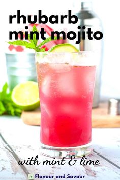 a pink drink with mint and lime in it