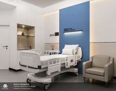 a hospital room with a bed, chair and medical equipment in front of a blue wall