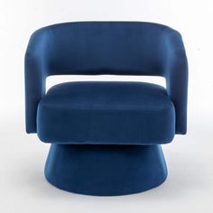 a blue chair sitting on top of a white floor