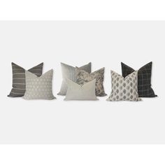 four pillows with different patterns on them