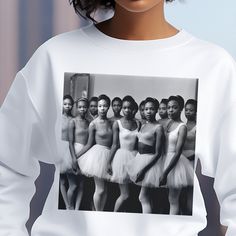 This ADULT UNISEX sweatshirt features a vintage style black and white image of black ballerinas. Inspired by dancers and theater arts enthusiasts, it's a soft top and offers a comfortable feel. The material is 50% cotton and 50% polyester; however, fabric content may vary based on the color sweatshirt you select. Available in multiple sizes and colors. Check the included measurement chart for just the right fit. An excellent gift for us. Visit The Trini Gee for more: https://www.etsy.com/shop/th Fitted Graphic Print Sweatshirt For Spring, White Casual Dance Top, Casual Tops For Dance In Fall, White Casual Tops For Dance, Casual White Top For Dance, Casual Tops For Fall Dance, White Graphic Print Top For Dance, Casual Crew Neck Top For Dance, Casual Long Sleeve Tops For Dance