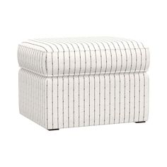 a white and black striped ottoman