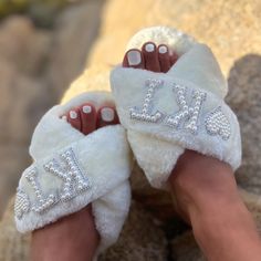 Get aisle ready with your bridesmaids in these custom Mrs. last name slippers. These cute Mrs. wedding slippers are essential for lounging around on your honeymoon or bachelorette party weekend. Also makes a super cute gift Idea for the bride. -Plush cushioning -Slip on style -Faux fur w/ pearl and rhinestone lettering -Model is US size 9 wearing slipper Size M Cowboy Hat Hair, Bridesmaid Slippers, Headband Veil, Puerto Rico Wedding, Bridal Slippers, Bride Slippers, Personalized Slippers, Groomsmen Socks, Bachelorette Party Weekend