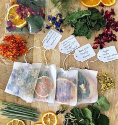 tea blending workshop with oranges, herbs and other items on a wooden table