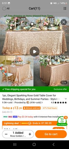 the table is set up with gold cloths and flowers on it for an event