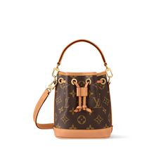 Products by Louis Vuitton: Nano Noé Lv Bucket Bag, Louis Vuitton Bucket Bag, Canvas Wallet, Louis Vuitton Official, Small Leather Goods, Leather Gloves, Leather Goods, Vuitton Handbags, Leather Accessories