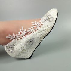 The all-white high heels are perfect for the wedding day, while the wedding shoes are made of soft fabric material, which keeps the feet comfortable. The bride shoes with flowers on top are perfect for special occasions or everyday wear, as well as a professional image. When you're looking for the perfect shoes for your big day, you want to make sure they look great and feel comfortable. Our Women's wedding shoes are perfect for any occasion, whether you're going to be walking for miles or just getting ready in the morning. With our wide selection of colors, styles, and sizes, we can't wait to help you find your perfect pair! The shoes will be shipped in 24 hours so you will get it on time. Our store has all kinds of cheap wedding shoes that you can choose from, such as high heels, wedges, Elegant Low Heel Wedding Flats, White Flat Heel Wedding Shoes For Formal Occasions, Elegant Closed Toe Wedding Court Shoes, Pearl White Wedding Shoes For Formal Occasions, White Lace Wedding Shoes For Bride, Elegant Pointed Toe Wedding Shoes For Ceremony, White Flat Wedding Shoes For Bride, Elegant Flat Wedding Shoes For Evening, Elegant Flat Wedding Shoes