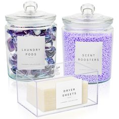 two glass containers filled with purple and white candy