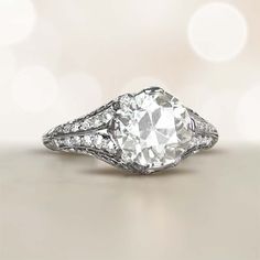 an old - fashioned diamond engagement ring