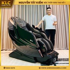 a man standing next to an electric massage chair