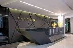 an empty lobby with a marble counter top