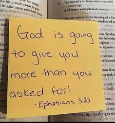 a note attached to an open book with the words god is going to give you more than you asked for