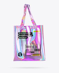 This holographic shopping bag mockup is the perfect way to showcase your branding in a unique and eye-catching way. The mockup features three different bag styles: hand, tote, and shoulder. Each bag is available in three different materials: canvas, linen, and cotton. The holographic effect adds a touch of futuristic style that will make your branding stand out from the competition. Tote Bag Packaging, Holographic Material, Creative Fabric, Apparel Mockup, Company Swag, Corporate Events Decoration