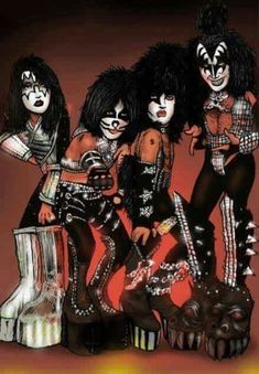 the kiss band in their halloween costumes