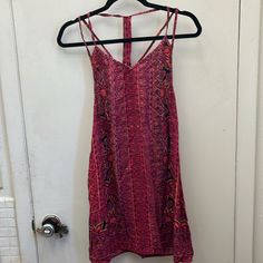 This Cute Dress Has 2 Straps Running On Both Shoulders . Forms Into A Racerback.Very Light Weight. Different Shades Of Pink.Floral Abstract Design. Size Small. Made By Angie. Nwt Measurements. 15" Pit To Pit Length 33". Purple Printed Summer Dress, Pink Bohemian Mini Dress With Spaghetti Straps, Bohemian Pink Spaghetti Strap Mini Dress, Purple Spaghetti Strap Beach Dress, Bohemian Purple Sleeveless Mini Dress, Purple V-neck Sundress, Purple Sleeveless Bohemian Midi Dress, Different Shades Of Pink, Strappy Dress