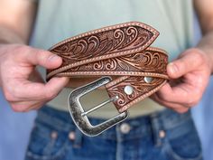 LENGTH - 1-1/2" Wide (38 millimeters wide) FIT - With a 5" room for adjustability, you'll be able to cinch your handmade leather belt as tight as you please. Our country western belt is available in sizes 28"-46". For the right fit, pick your belt at 2" longer than your waist size. (Example, if you wear a size 36 pants, you should order a size 38 belt) FULL GRAIN LEATHER IN ONE-PIECE - (Selected Genuine Grade Leather). Our cowboy inspired belt is made from only quality full grain leather, each w Mens Western Belt Buckles, Mens Leather Belts, Country Belts, Cowboy Accessories, Cowboy Buckle, Leather Tool Belt, Cowboy Belt Buckles, Custom Leather Belts, Cowgirl Belts