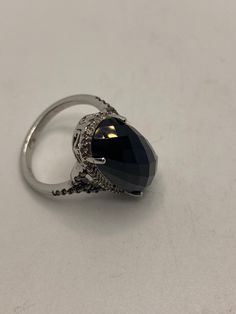 Vintage black onyx champaign diamond ring 925 sterling silver size 7 Set with a tiny row of pink sapphires Sterling Filigree Setting Handmade Size 9 can be re sized for you. My jeweler charges a $10-$20 fee Sterling Silver is rhodium finished to prevent tarnish All rings are shipped in a nice gift box. Check out our over a THOUSAND great reviews!!! Engraving is $4 per letter and is not always perfect depending on the piece. It can take a few days if the jeweler is busy. This is payable to Paypal Judithsltd@gmail.com Mermaid Ring, Pink Sapphire, Black Onyx, 925 Sterling Silver Ring, Silver Fashion, Vintage Black, Statement Rings, Onyx, Diamond Ring