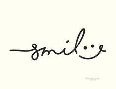 the word smile written in cursive handwriting