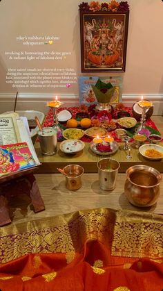 the table is full of food and candles for diwaling to be served on